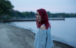 close up over shoulder on the beach deborah lawrence photography
