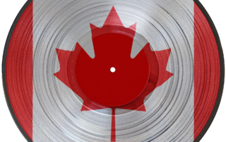 A picturedisc vinyl record of the flag of Canada isolated on a white background.